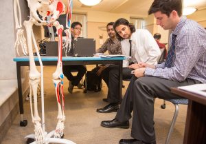 College of Podiatric Medicine students from left, Danny Wang, Parth Dixit, Anker Gill and Zachary Gustin, all Class of 2018, study lower limbs in the VRLC, preparing for their board exams. The learning envirnment is part of WesternU's Learning Enrichement in Clinical Anatomy (LECA). (Jeff Malet, WesternU)