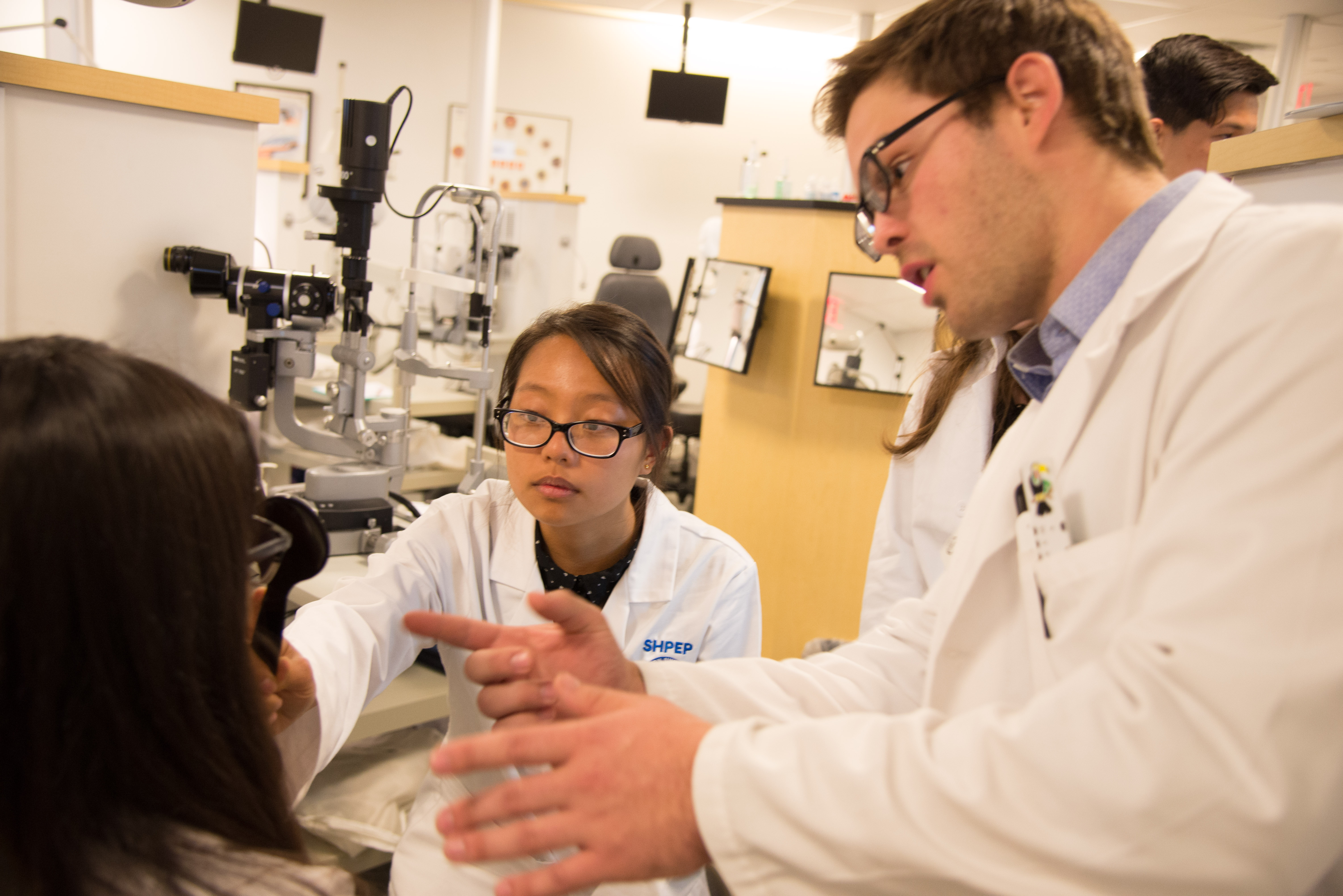 Crystal Sin participates in the optometry rotation during WesternU SHPEP Tuesday June 27, 2017