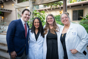 Group photo of speakers at the CPM White Coat Ceremony